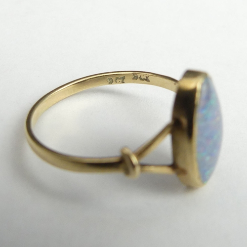 40d - 9ct opal doublet single stone ring, 1.5 grams. Size M. UK Postage £12.