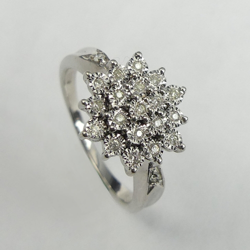 33 - 9 carat white gold diamond cluster ring, 3.8 grams. Size O, 12.6 mm wide. UK Postage £12.