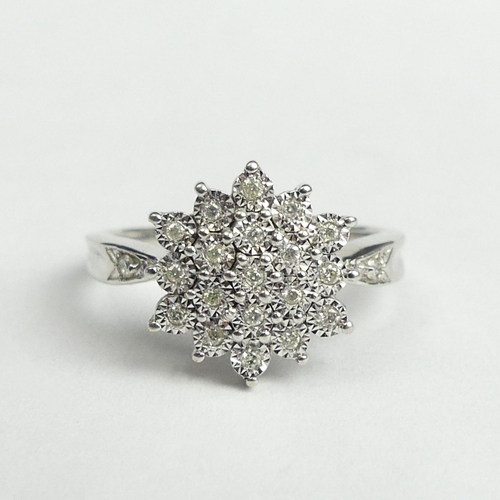 33 - 9 carat white gold diamond cluster ring, 3.8 grams. Size O, 12.6 mm wide. UK Postage £12.