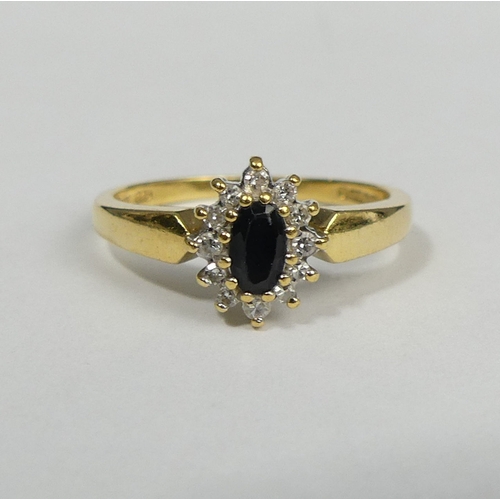 10d - 18ct gold sapphire and diamond ring, 3 grams. Size O 1/2, 9.6 mm wide. UK Postage £12.