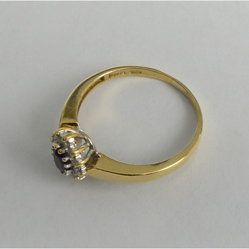 10d - 18ct gold sapphire and diamond ring, 3 grams. Size O 1/2, 9.6 mm wide. UK Postage £12.