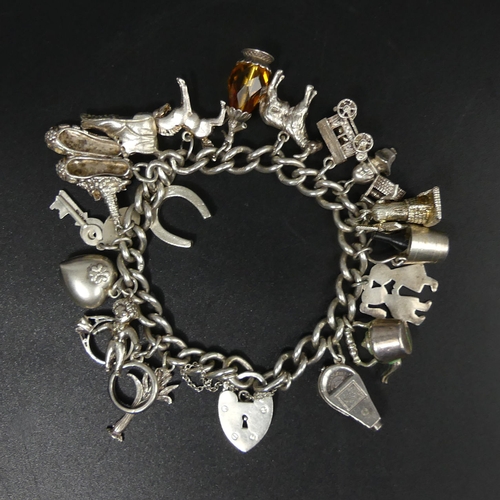 10f - Sterling silver curb link charm bracelet, 70.5 grams. UK Postage £12.