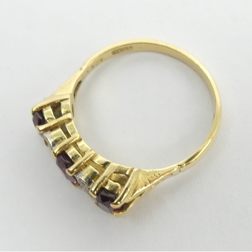 16 - 18ct gold garnet and diamond ring, 4.6 grams. Size O, 6.6 grams. UK Postage £12.