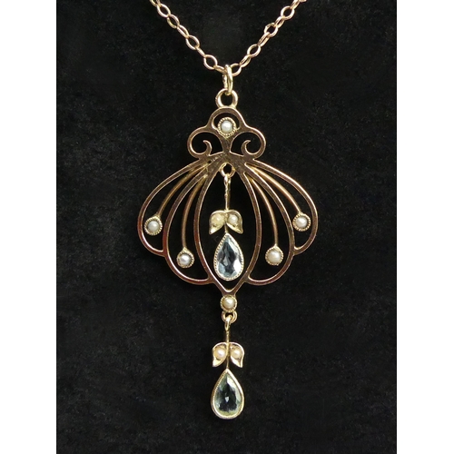 18 - 9ct gold aquamarine and seed pearl pendant and 14ct gold chain, 5.1 grams. Chain 48 cm, Pendant 47 m... 