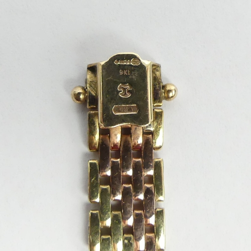 19 - 9ct gold panther link bracelet, 11.9 grams. 18 cm x 8.8 mm. UK Postage £12.