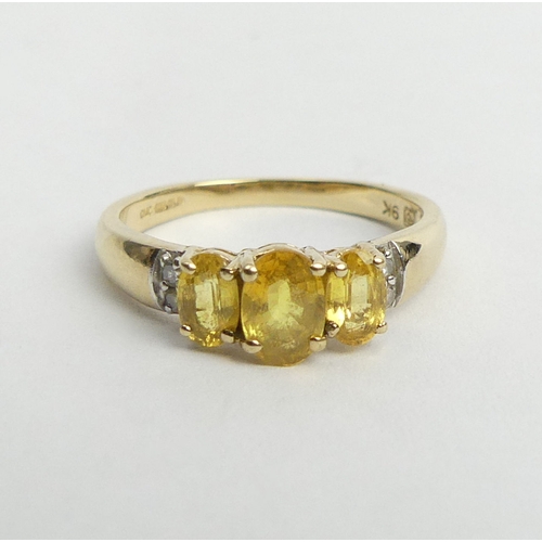 21 - 9ct gold citrine and diamond ring, 1.9 grams. Size M, 5.8 grams. UK Postage £12.