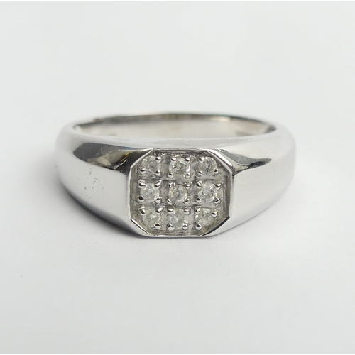 4 - 9ct white gold diamond set signet ring, 5.9 grams. Size T 1/2, 8.3 mm. UK Postage £12.