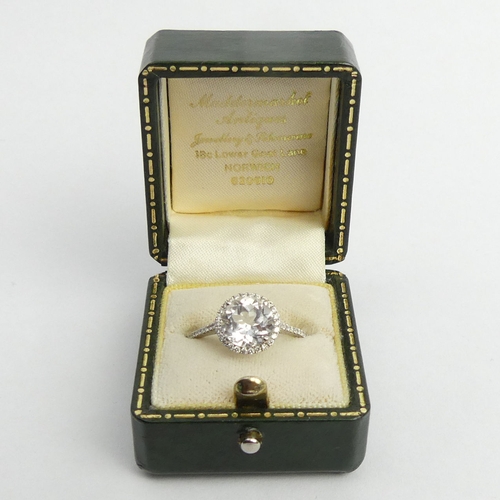 6 - 18ct white gold white topaz and diamond ring, 2.7 grams. Size M. UK Postage £12.
