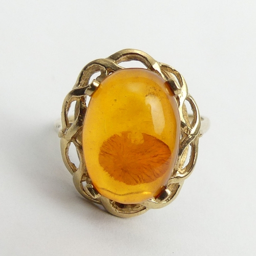 32 - 9ct gold amber set ring, 2.6 grams. Size N, 18.1 grams.  UK Postage £12.