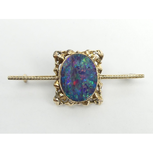 38 - 9ct gold opal doublet brooch, 4.8 grams. 52 x 20 mm. UK Postage £12.