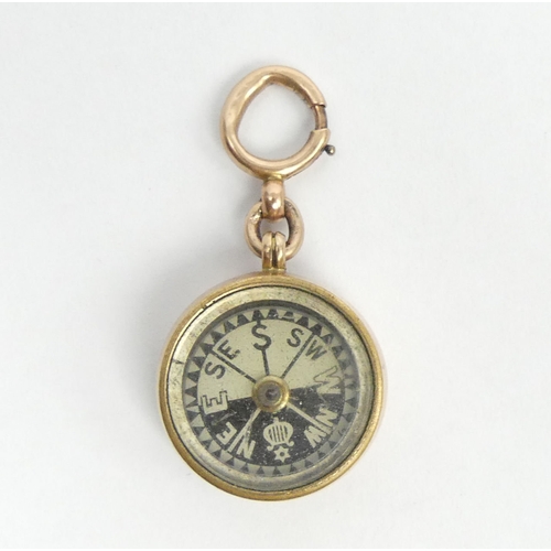 39 - George V 9ct gold compass fob, Birm.1922, 7.2 grams. 19 mm dia. UK Postage £12.
