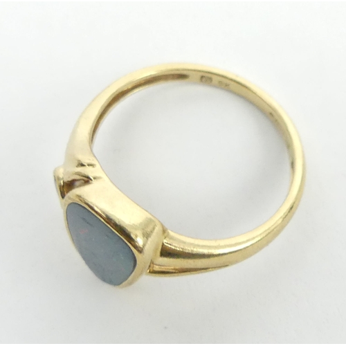 40 - 9ct gold opal doublet and amethyst ring, 2.4 grams. Size N, 12.2 mm. UK Postage £12.