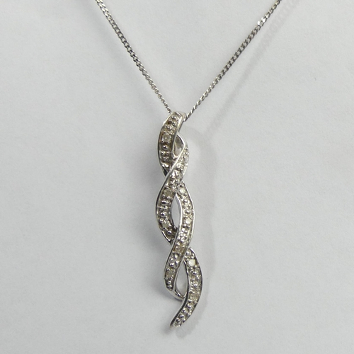 45b - 9ct white gold diamond pendant and chain with matching earrings, 3 grams. Pendant 25 mm. UK Postage ... 