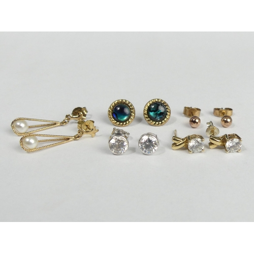 45d - Five pairs of 9ct gold earrings, 5 grams. UK Postage £12.
