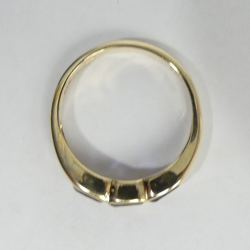 10 - 9ct gold purple three stone ring, London 2001, 2.4 grams. Size M, 4.95 mm. UK Postage £12.