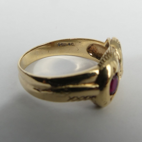 12 - 9ct gold and garnet snake design ring, London 1971, 7 grams. Size Z 1/2, 10.8 mm. UK Postage £12.