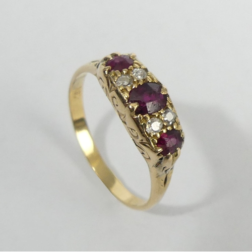 3 - 18ct gold ruby and diamond ring, 3.7 grams. Size P, 5.6 mm. UK Postage £12.
