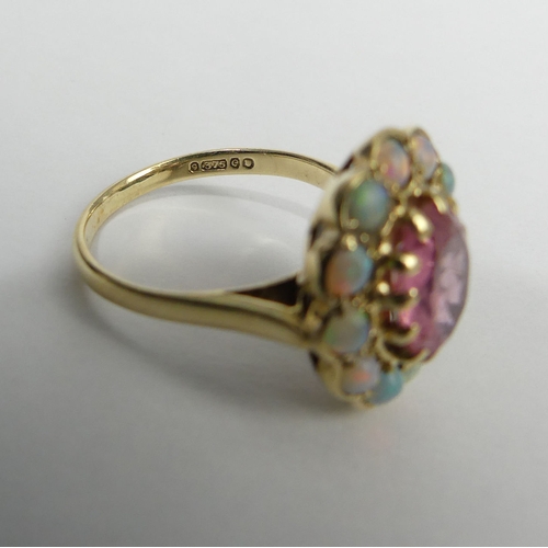 25 - 9ct gold opal and tourmaline ring, London 1960, 4.1 grams. Size N, 17 mm. UK Postage £12.