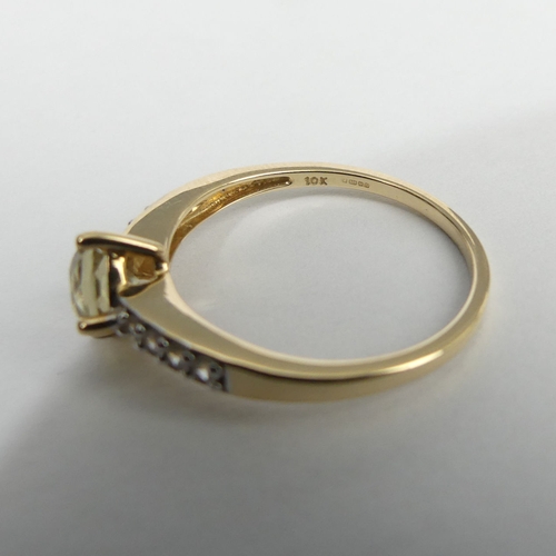 27 - 9ct gold topaz and citrine ring, 2 grams. Size Q, 7.7 mm. UK Postage £12.