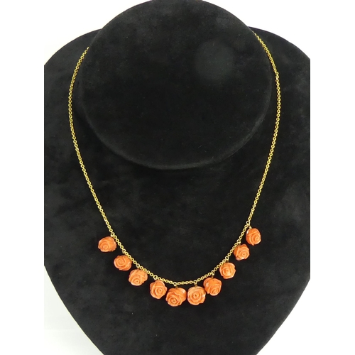 32 - 15ct gold and carved coral necklace, 12 grams. 40 cm. UK Postage £12.
