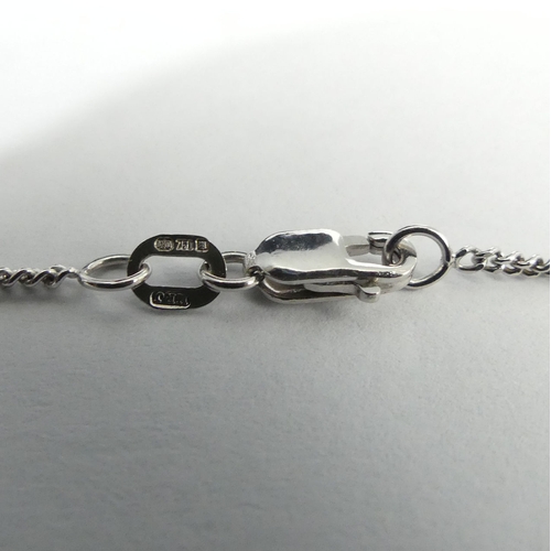 33 - 18ct white gold sapphire pendant and chain, 5.8 grams. Stone 8.2 x 11 mm, chain 45 cm. UK Postage £1... 