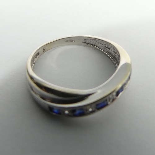 36 - 9ct white gold sapphire and diamond ring, 2.3 grams. Size L 1/2, 5.3 mm. UK Postage £12.