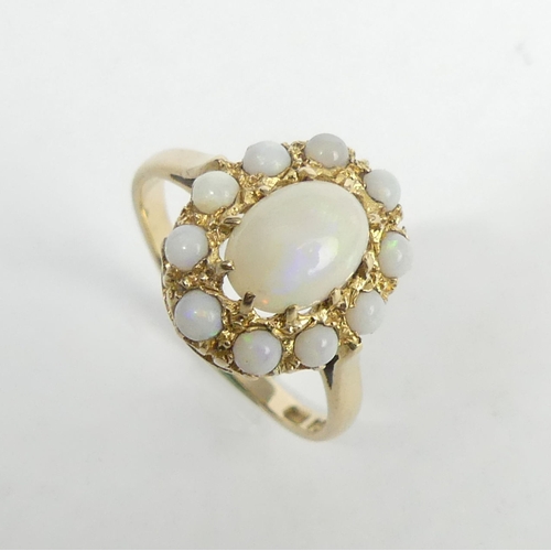 40 - 9ct gold opal cluster ring, 2.5 grams. Size N 1/2, 14.3 mm. UK Postage £12.