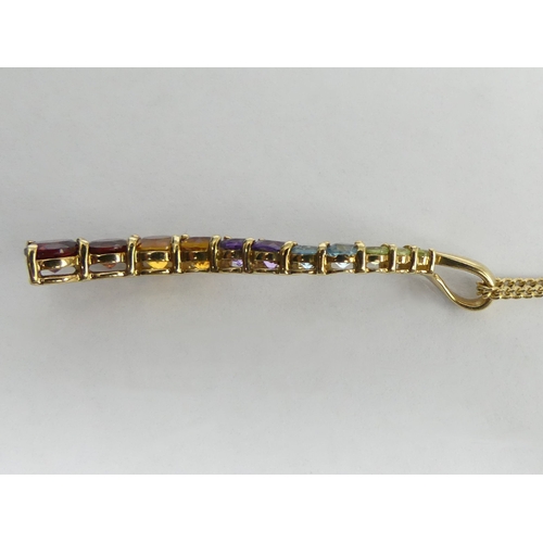 52 - 9ct gold multi-gem set pendant and chain, 5.8 grams. Pendant 42 mm, chain 58 cm. UK Postage £12.