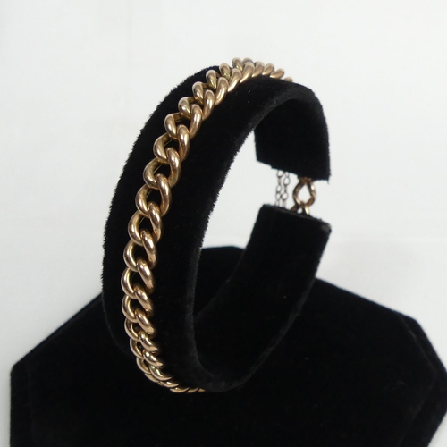 55 - 9ct rose gold curb link bracelet, 7 grams. 18 cm x 5.7 mm. UK Postage £12.