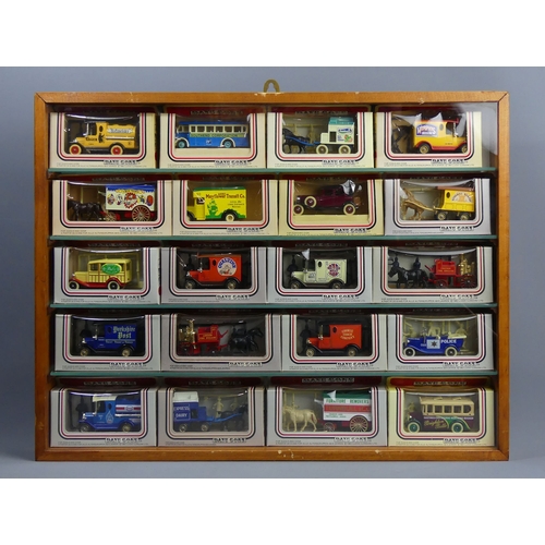 307 - Five wood and glass display cabinets housing Matchbox and Lledo die-cast vehicles in their boxes. Co... 