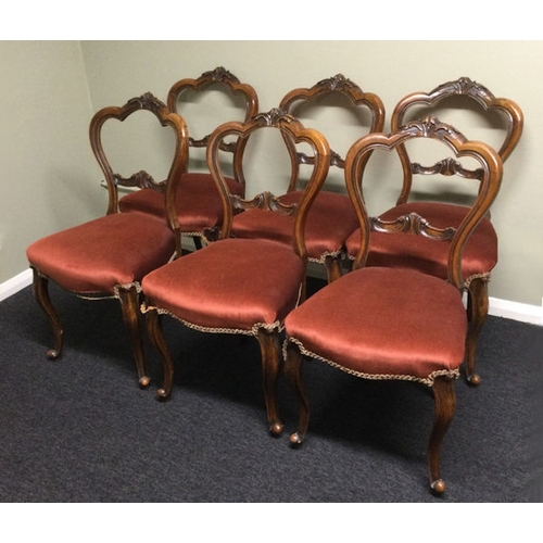 332 - A set of six Victorian walnut cloud back dining chairs, circa 1880. Collection only.