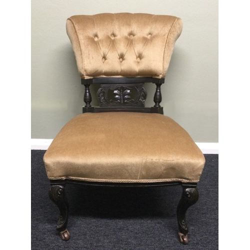 337 - An Edwardian upholstered nursing chair on cabriolet legs. 49 x 72 cm. Collection only.