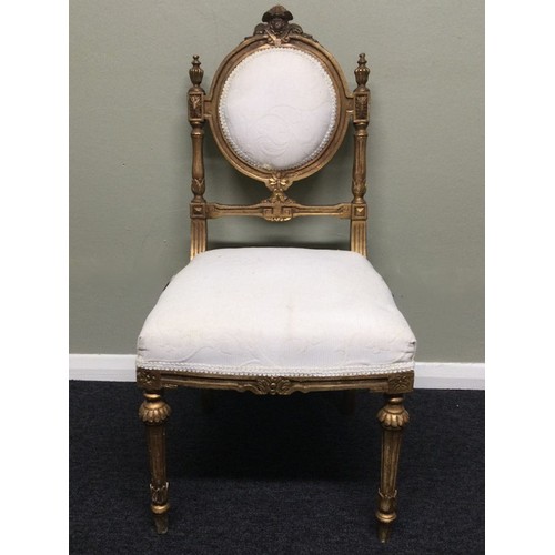 338 - An ornate gilt wood salon chair. 41 x 82 cm. Collection only.