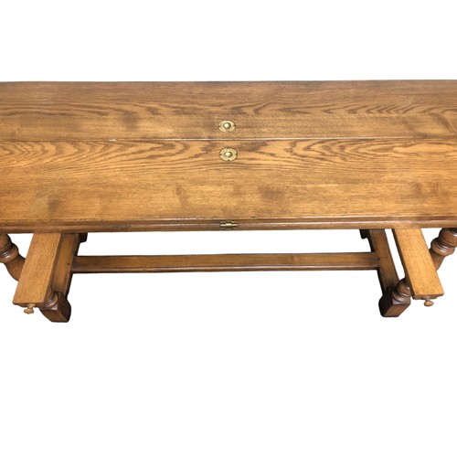 334 - A good quality oak refectory table with extendable flaps and brass fitments. 185 cm x 50 cm (closed)... 