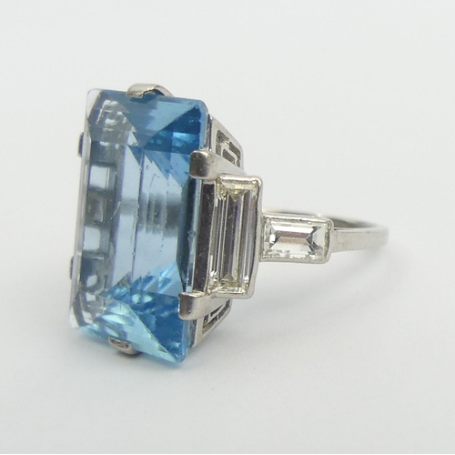 11 - Platinum (tested) aquamarine (approx. 11cts) and diamond ring, 6.5 grams. Size I, 18 mm. UK Postage ... 