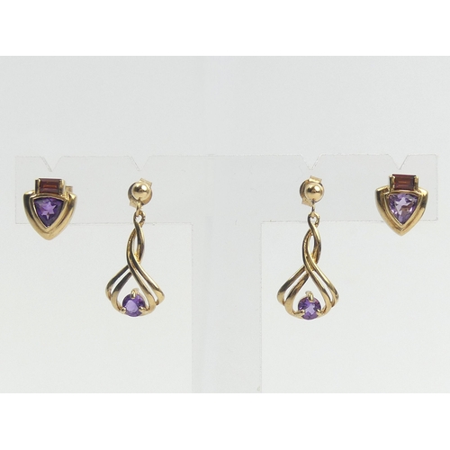 12 - A pair of 9ct gold amethyst and garnet earring a pair of 9ct gold amethyst drop examples. 4 grams. U... 