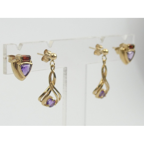 12 - A pair of 9ct gold amethyst and garnet earring a pair of 9ct gold amethyst drop examples. 4 grams. U... 