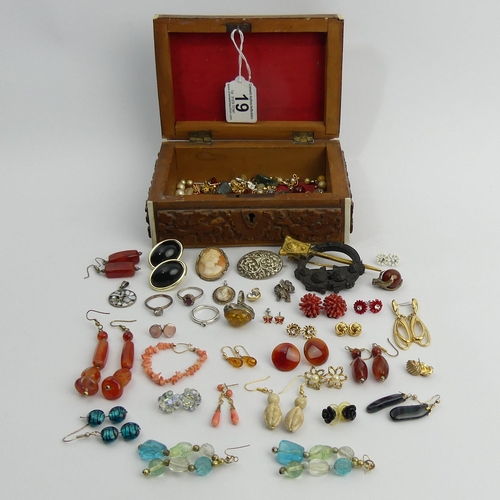 19 - A box of costume and silver jewellery including a Celtic design kilt pin. UK Postage £12.