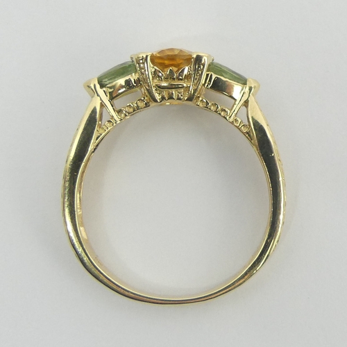 3 - 9ct gold citrine and peridot ring, 2.9 grams. Size N 1/2, 7 mm. Uk Postage £12.