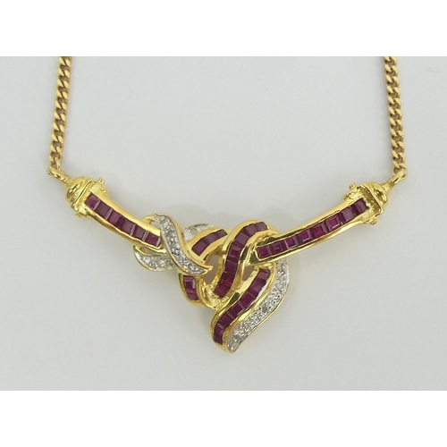 5 - 18ct gold ruby and diamond necklace, 9.2 grams. 45 cm long, centre 40 mm. Uk Postage £12.