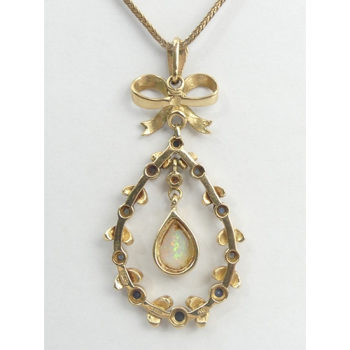 25 - 9ct gold sapphire and opal pendant and chain, 88 grams. Pendant 47 mm, chain 50 cm. UK Postage £12.