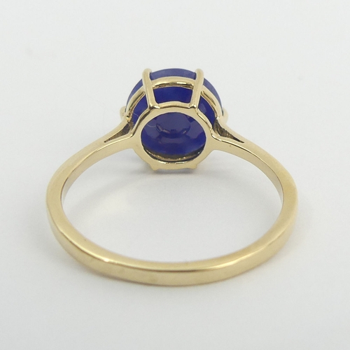 26 - 9ct gold sapphire solitaire ring, 2.6 grams. Size S, 10 mm wide. UK Postage £12.