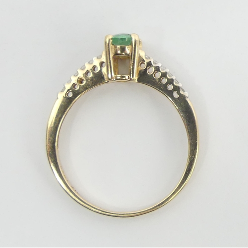 28 - 9ct gold emerald and white topaz ring, 1.4 grams. Size L 1/2, 6 mm wide. UK Postage £12.