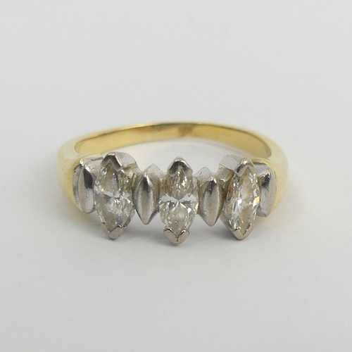 31 - 18ct gold tested marquise diamond trilogy ring, 4.5 grams. Size L, 6.8 mm wide. UK Postage £12.