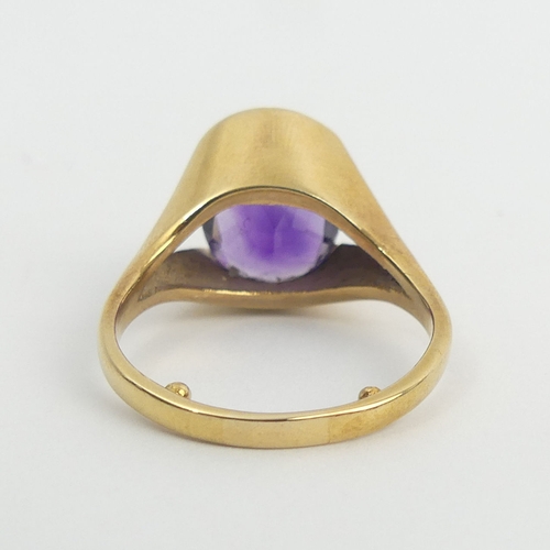 34 - 9ct gold tension set amethyst single stone ring, 5.7 grams. Size N 1/2 with reducers, 14.24 mm wide.... 