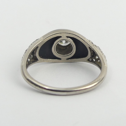 39 - Platinum tested onyx and diamond (centre approx. 1/2ct) ring, 3.5 grams. Size M, 9.3 mm wide. UK Pos... 
