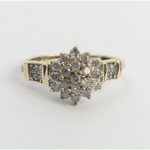 45 - 9ct gold .5ct diamond cluster ring, 2.4 grams. Size Q, 10.8 mm wide. UK Postage £12.