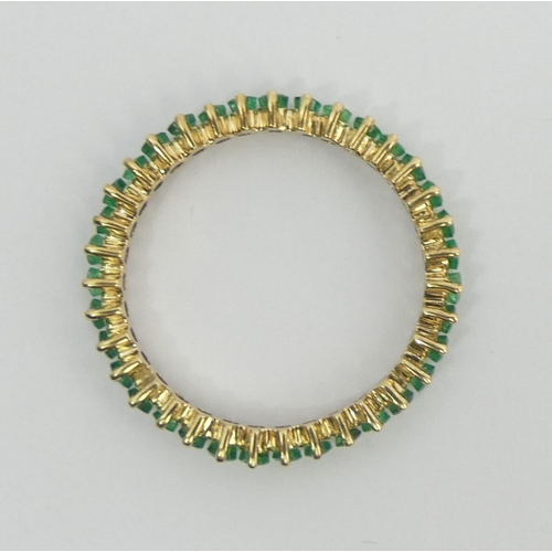 49 - 9ct gold emerald full eternity ring, 2.1 grams. Size T, 3.2 mm wide. UK Postage £12.