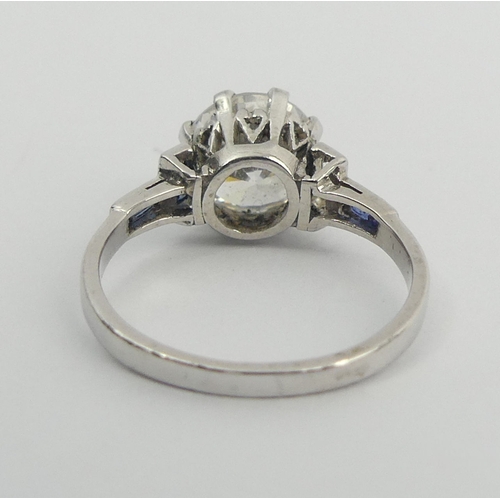 50 - Platinum c.z and sapphire ring, 3.5 grams. Size J 1/2, 8.6 mm wide. UK Postage £12.