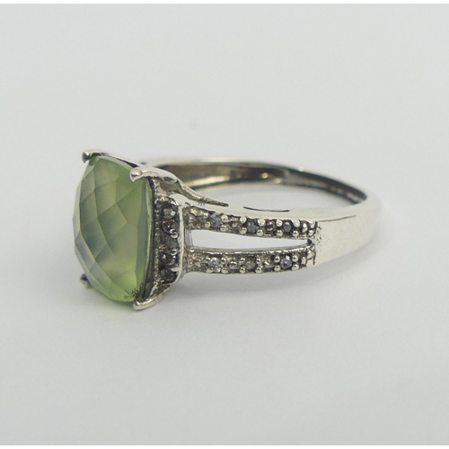 55 - Sterling silver prehnite and diamond ring, 3 grams. Size O, 10.35 mm wide. UK Postage £12.